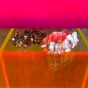 Two stretchy band bracelets.